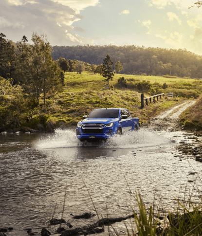 Adventure Pick Up Truck Driving through Ford